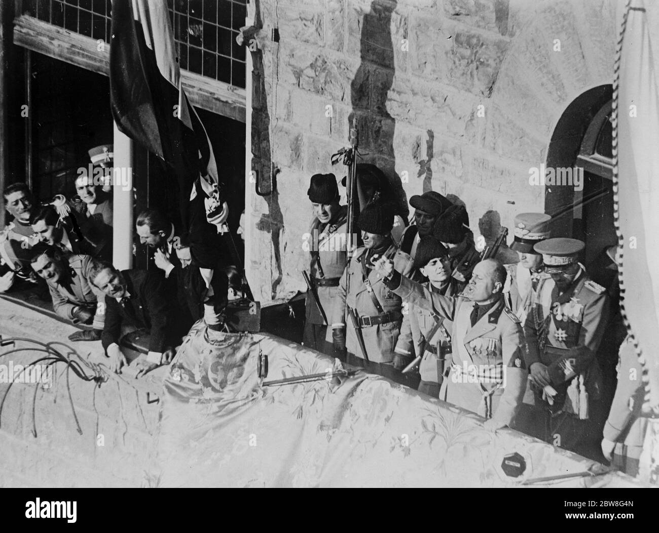 Over 100,000 people listen to a  fiery  speech by Mussolini . Signor Benito Mussolini delivered a  fiery  speech to a gathering of more than 100,000 people in and around the Piazza della Signoria , Florence . 21 May 1930 Stock Photo