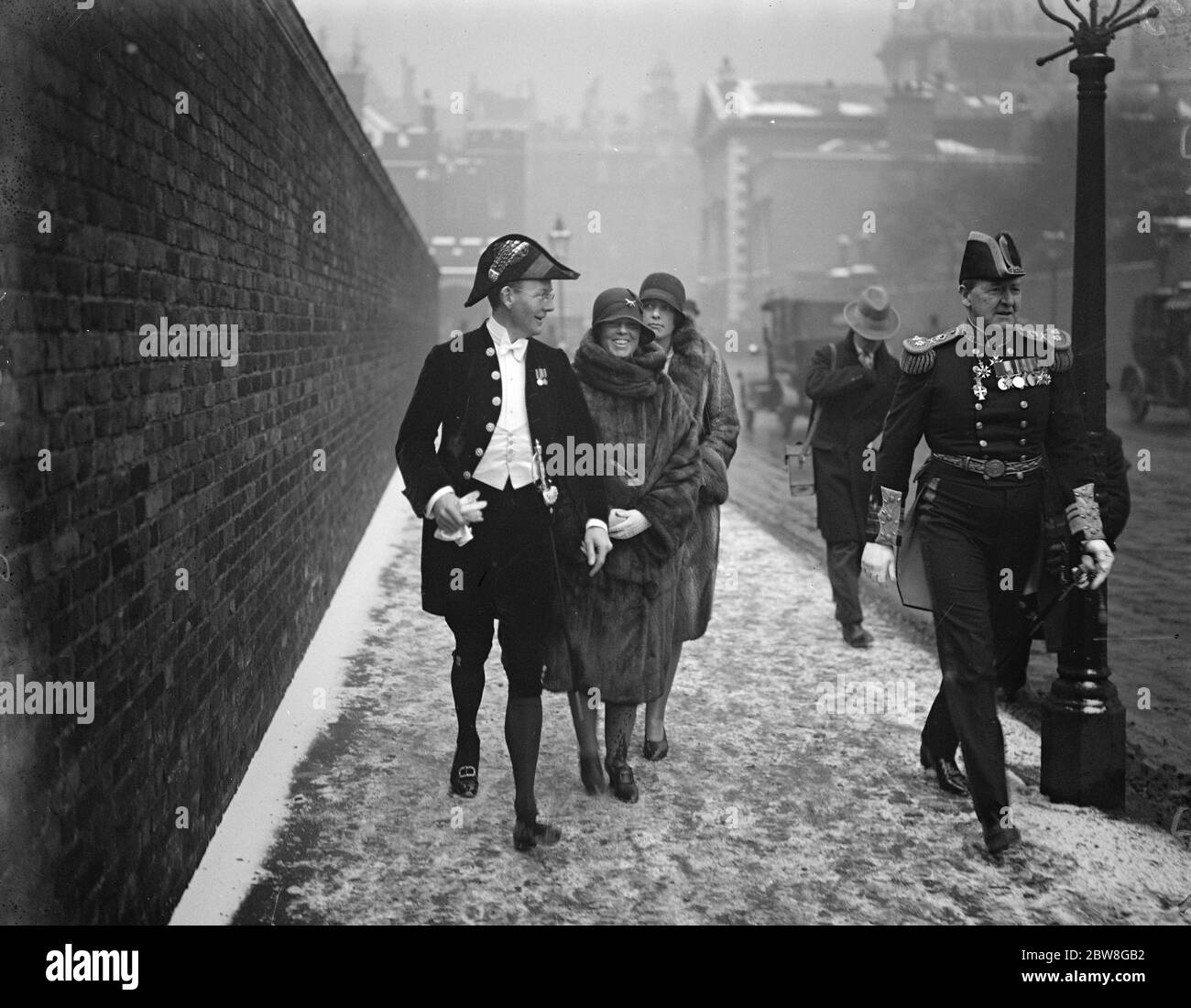 The Prince of Wales acts for the King at a Levee . Vice Admiral Sir Percy Royds leaving with friends . 26 February 1929 Stock Photo