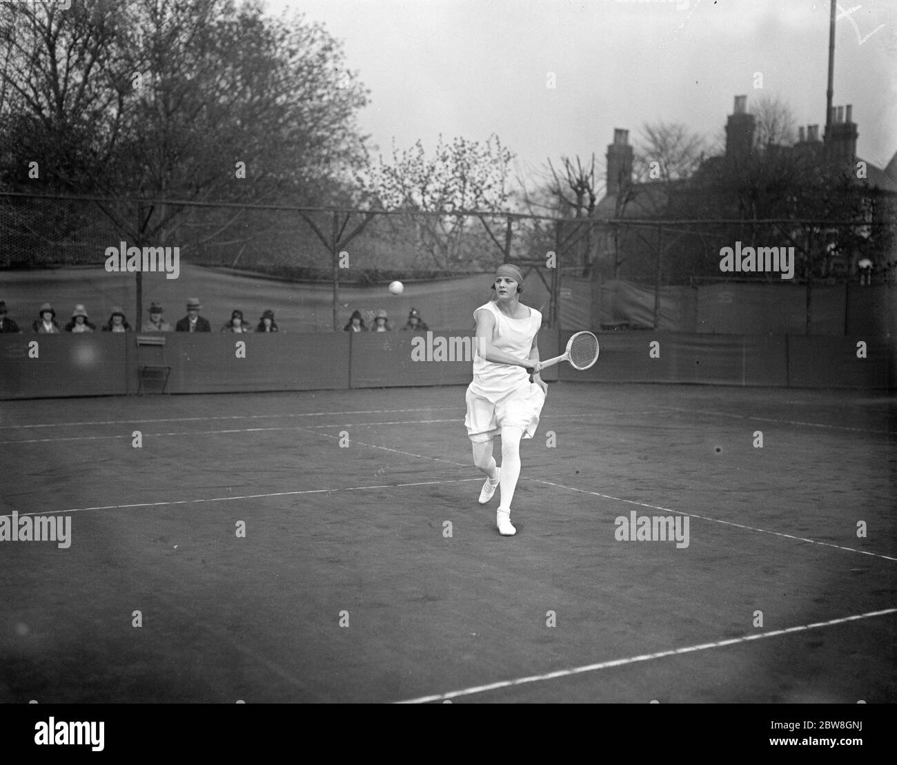 West Side Country Club Tennis . Miss Eileen Bennett in play against Betty Nuthall . 27 April 1929 Stock Photo
