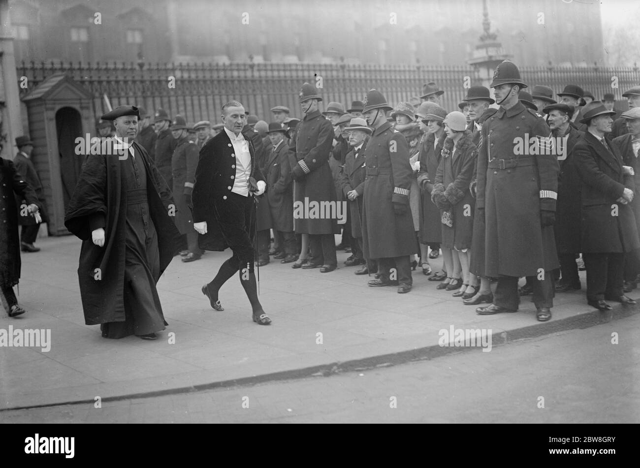 The King holds a levee at Buckingham Palace . The Reverend C H Hamilton , the Vicar of Windsor , leaving with Dr Jonathan . 27 March 1930 Stock Photo