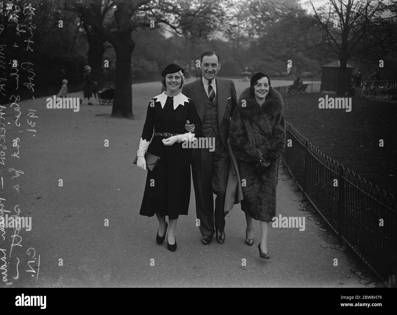 Fine weather brings out the stars . Miss Norah Swinburne , Mr Paul England and Miss Pat Patterson , the popular Radio , stage and film stars taking a stroll in Regent 's Park . 15 October 1931 Stock Photo