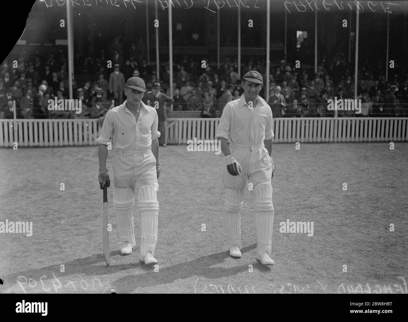 The second day of the Test Match at the Kennington Oval . England versus the West Indies . Fred Bakewell , who played a great innings for England and scored 107 , going out to resume his innings after lunch with James Langridge . 12 August 1933 Stock Photo