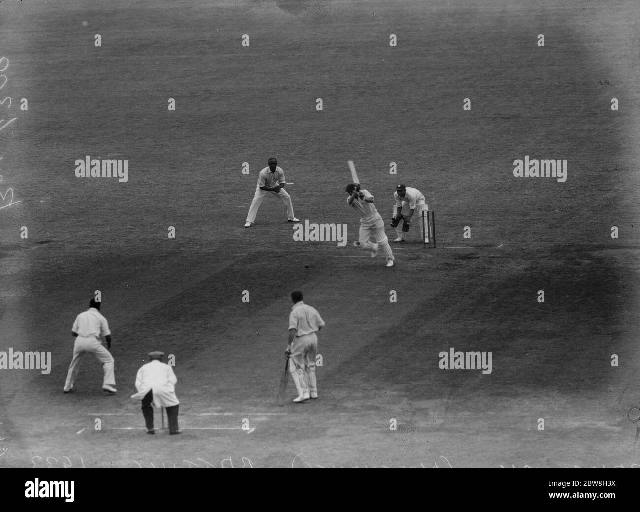 The second day of the Test Match at the Kennington Oval . England versus the West Indies . Fred Bakewell , goes down the pitch and drives  Puss  Achong . 12 August 1933 Stock Photo