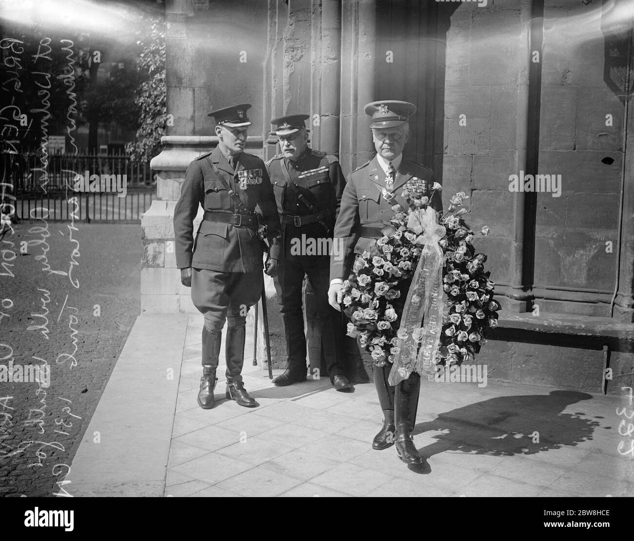 American Army 's tribute to grave of unknown warrior in London . Brigadier General Horton supported by Lord Denbigh , and officers of the HAC laid a wreath on the Tomb of the Unknown Warrior in Westminster Abbey , on behalf of the Ancient and Honourable Artillery Co , of Massachusetts . Brigadier General Horton ( with wreath ) outside the Abbey . 7 July 1931 Stock Photo