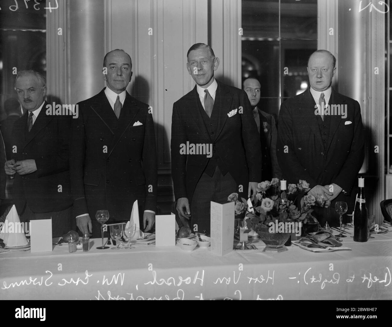 The German Ambassador attends foreign press association luncheon at the Savoy hotel , London . Left to right The German Ambassador , Herr von Hoesch , Mr Eric Swenne ( President ) and Count Bernstorff . 17 November 1932 Stock Photo