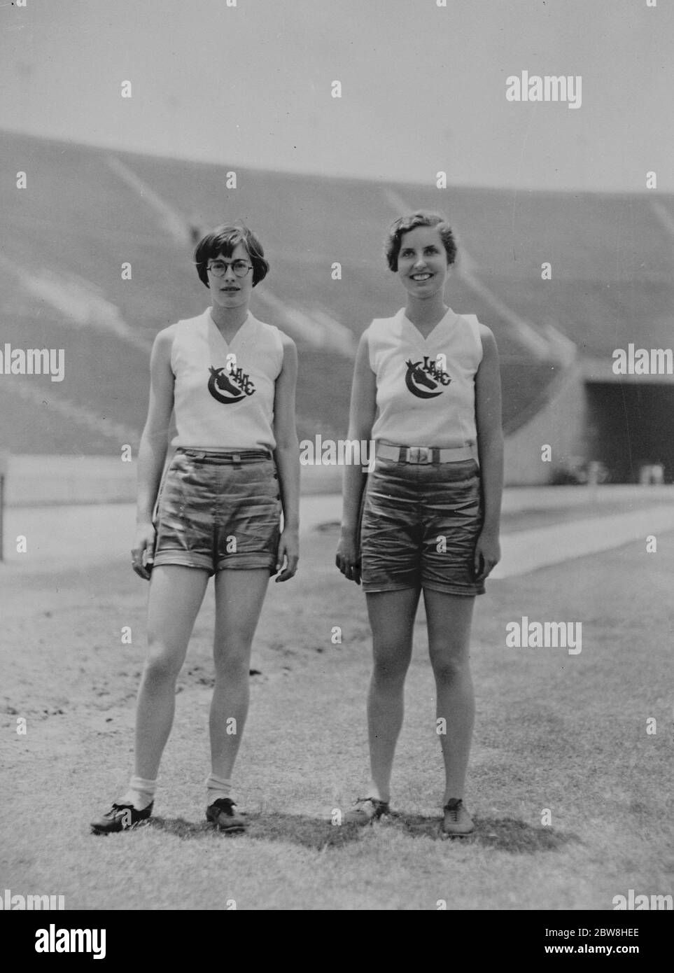 Fair track stars . Miss Ann O ' Brien , the American woman hurdler who is to compete in the 1932 Olympic Games , and Miss Vivian Furtch , the American all round woman athlete , on the track at Los Angeles Stadium . 29 September 1931 Stock Photo