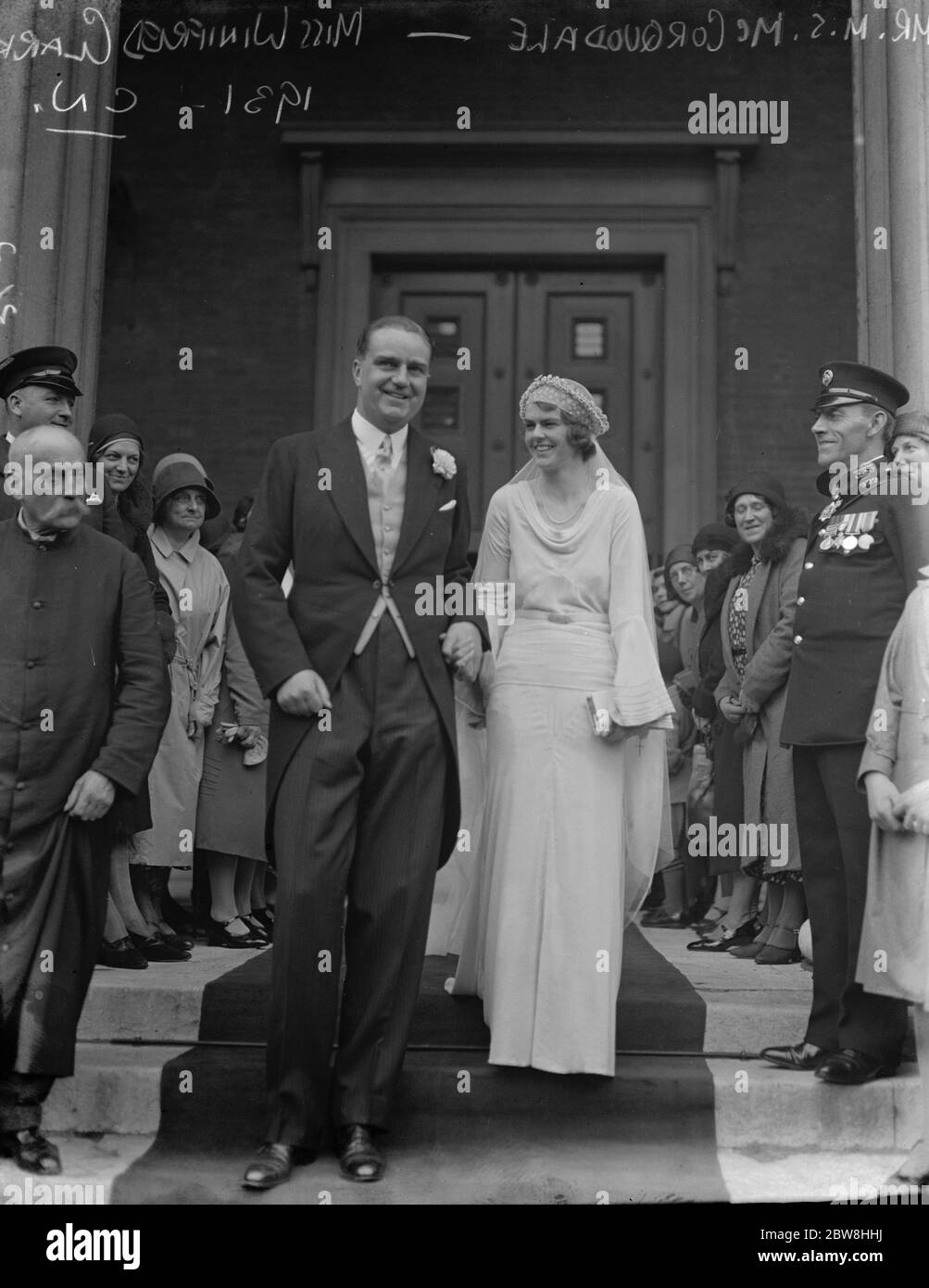Wedding of Mr M S McCorquodale and Miss Winifred Clark at St Peter ' s , Eaton Square . The bride and bridegroom leaving . 6 October 1931 Stock Photo