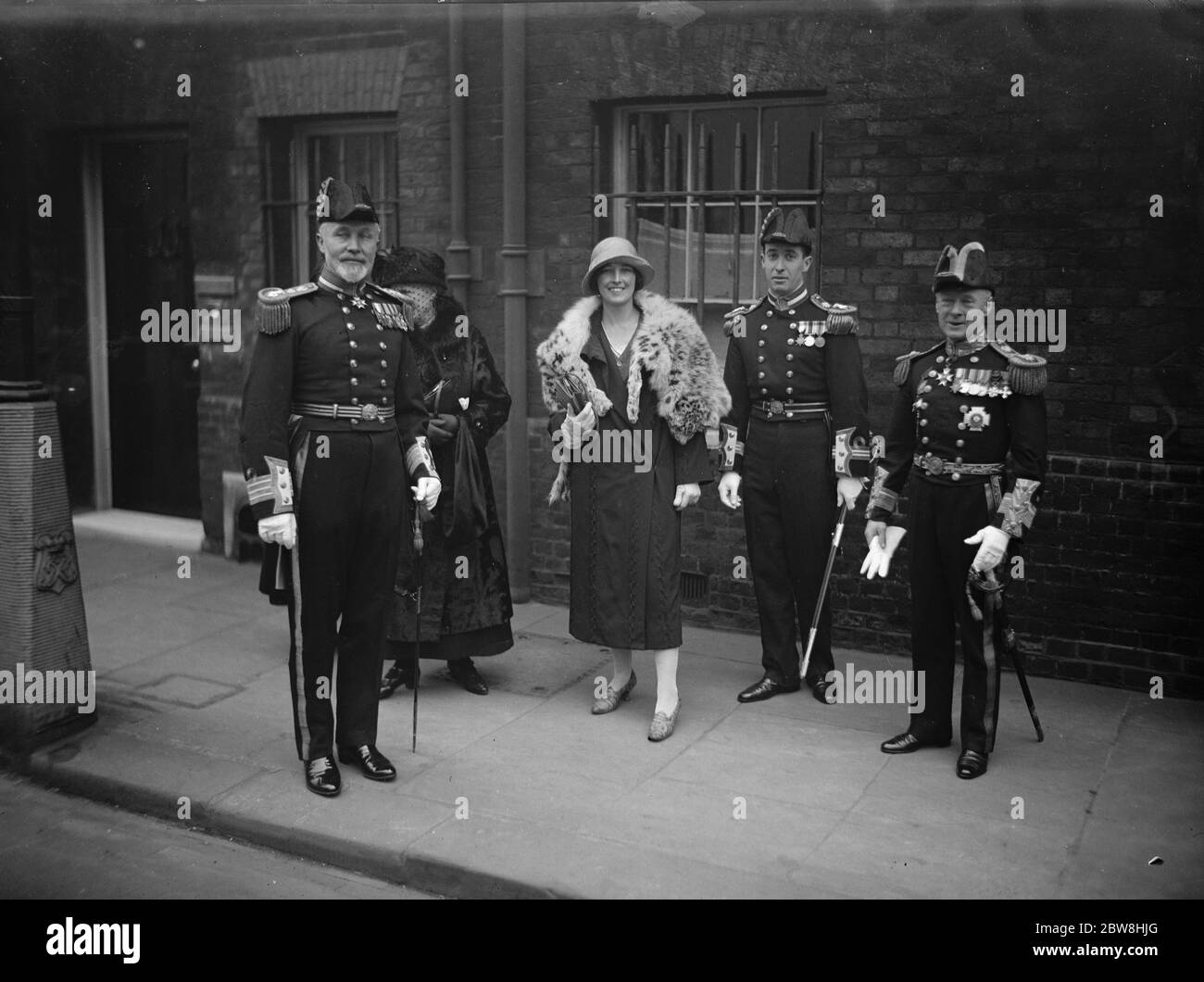 Levee at St James 's Palace . Left to right : Captain Gask , Lt Pollard , KCB , and Commander Borrow leaving . 19 March 1925 Stock Photo
