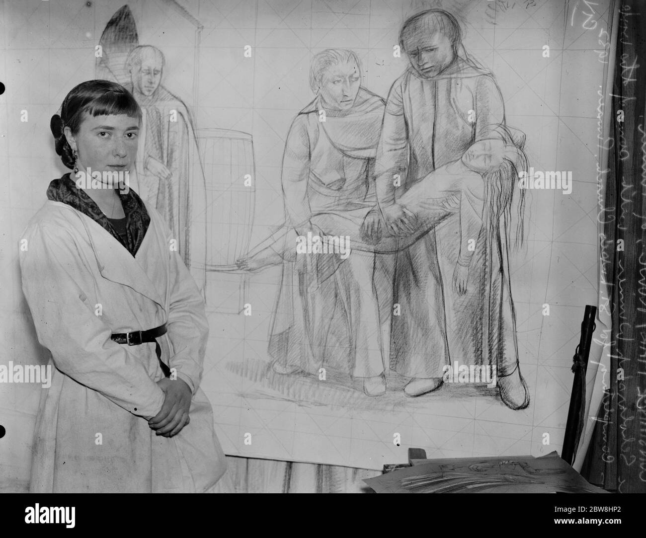 Rome scholarship winner 's new commission . Miss Constance Mary Rowe , of Pinner , with some of the work she is completing for the Chapel of St Philomela in St Luke 's Church , Pinner . 19 February 1932 Stock Photo