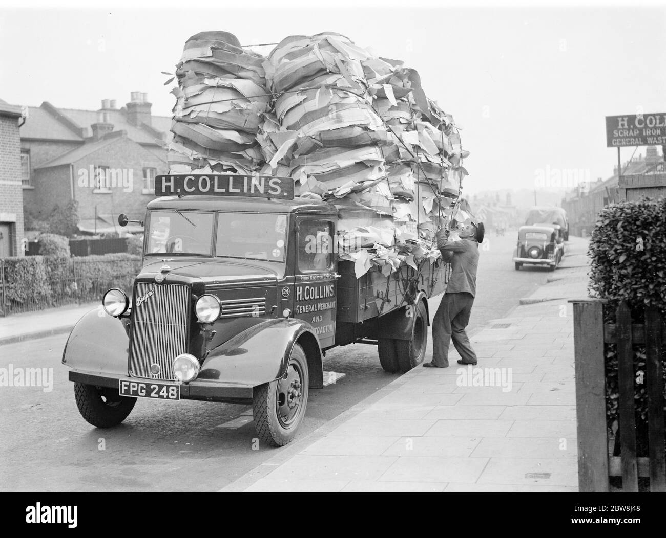 Iron metal and waste merchants . 1937 . Stock Photo