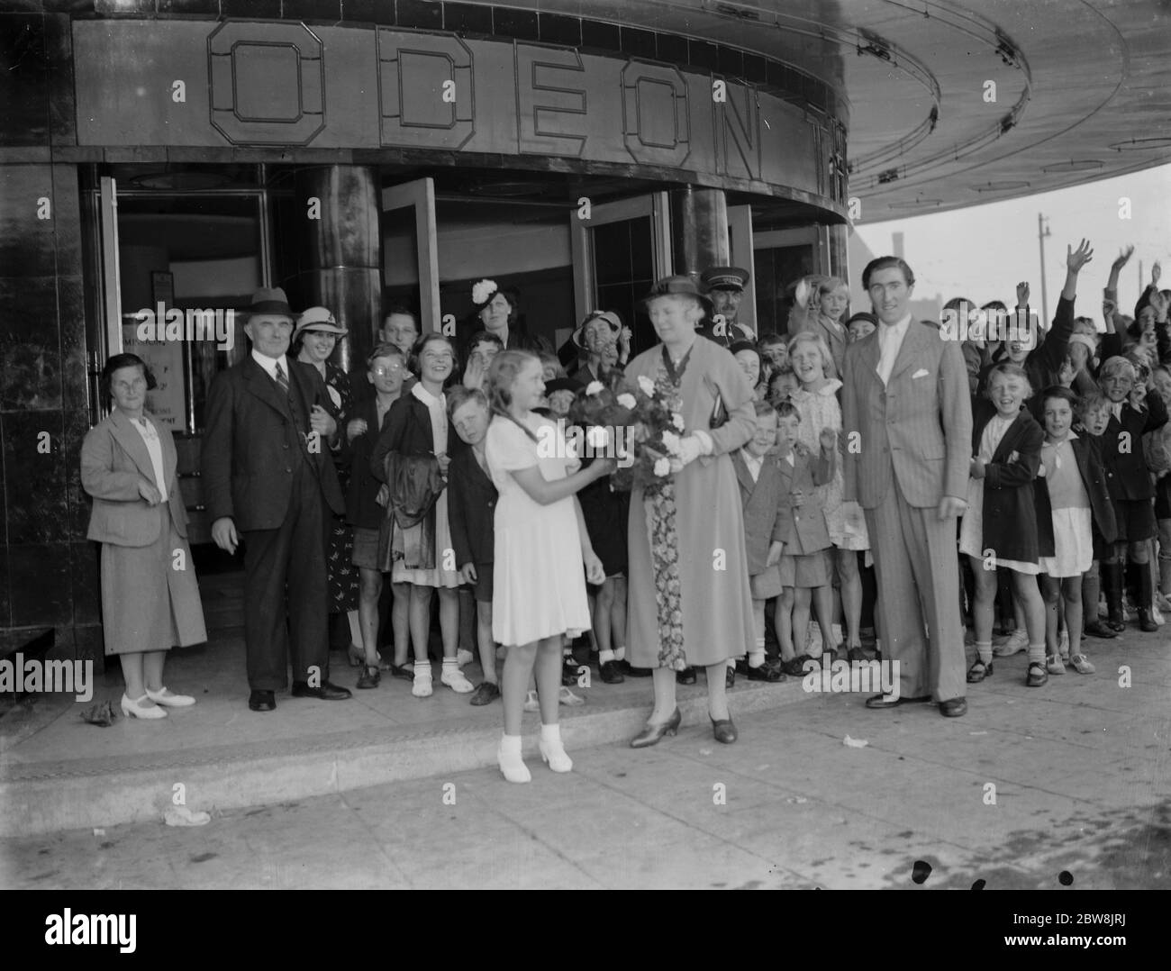 Odeon Well Hall , members of Mickey Mouse Club at Odeon . Councillor Mrs Mabel Grout 1937 Stock Photo