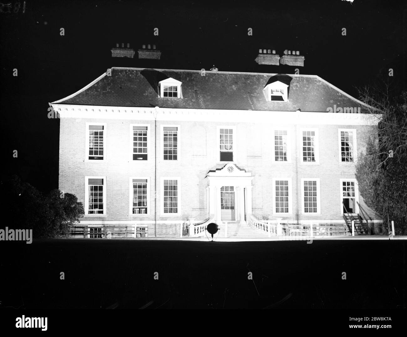 The exterior of the Royal Blackheath Golf Club , litup at night . 1935