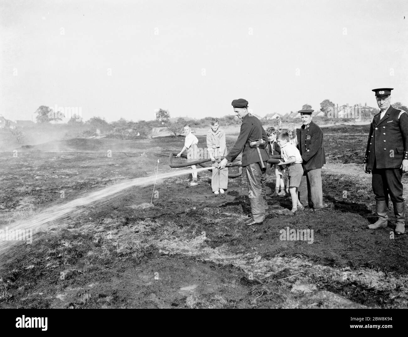 Fire Brigade put out a fire on Dartford Heath . 6 September 1937 Stock Photo