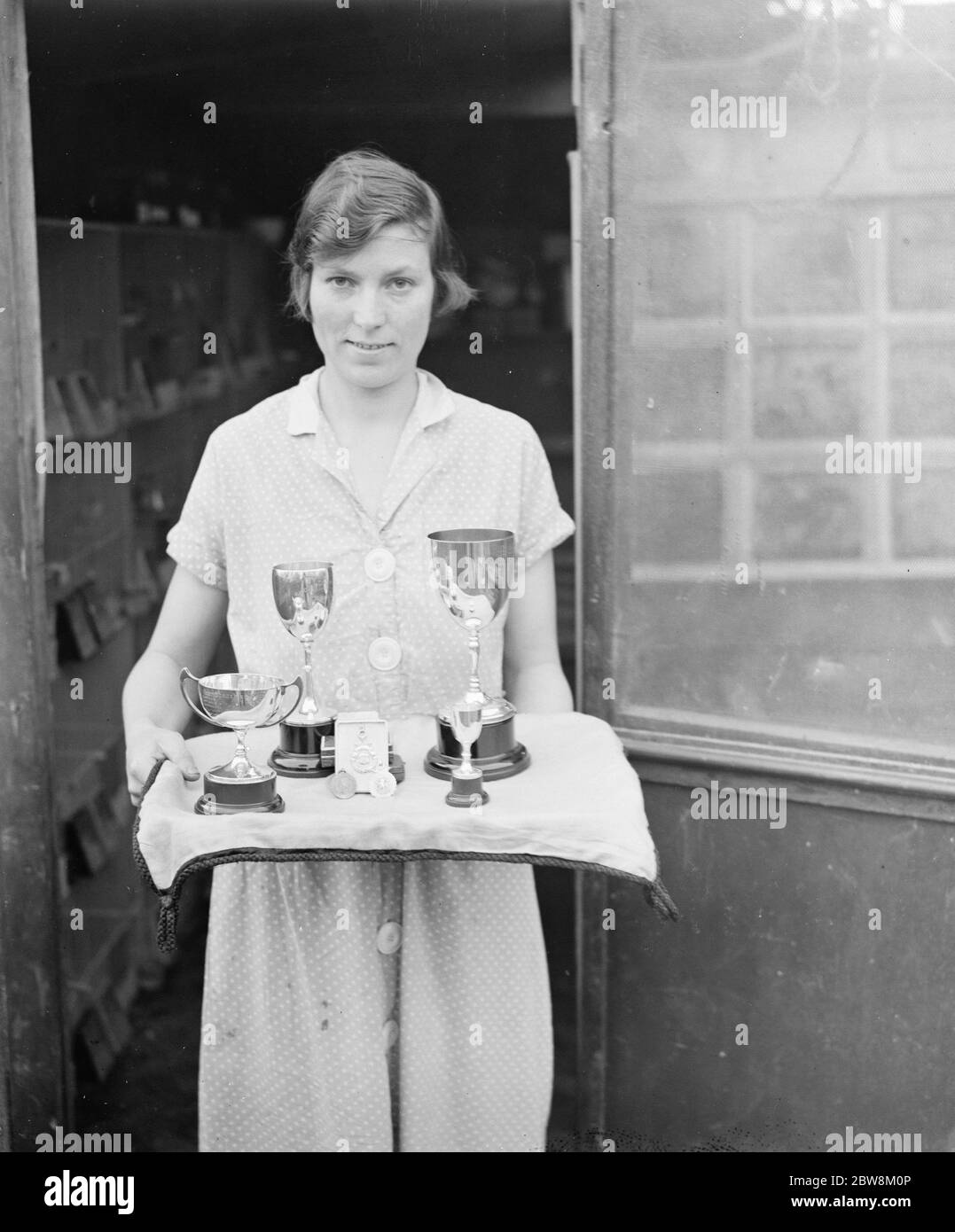 Trophies won by Mrs J W Slade in Sidcup for her caged birds and canaries . 1937 Stock Photo