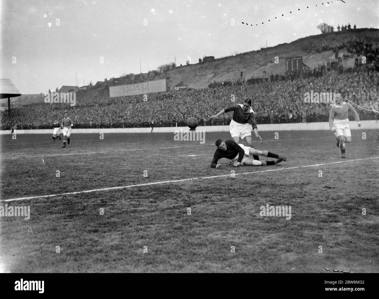 Football match ; A goalkeeper makes a save . 1935 Stock Photo