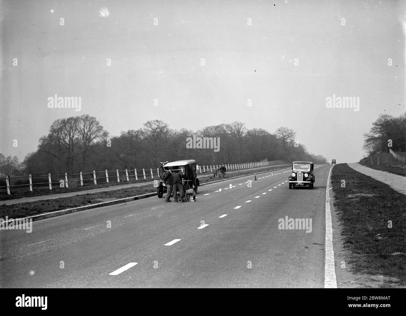 Road with white lane markings Black and White Stock Photos & Images - Alamy
