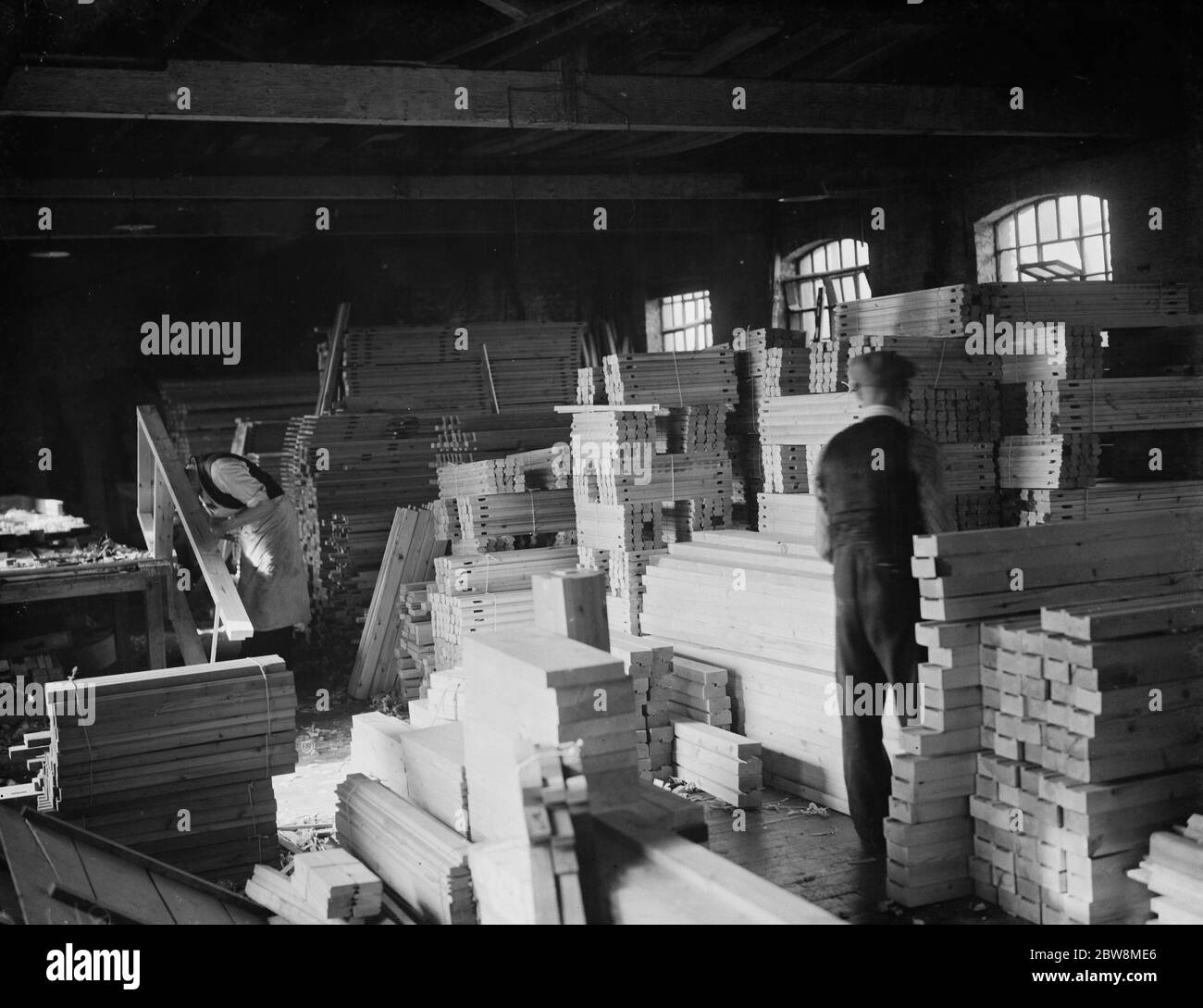 A joiner works on a piece at the G Ellis joinery works in Hackney . 7 April 1938 Stock Photo
