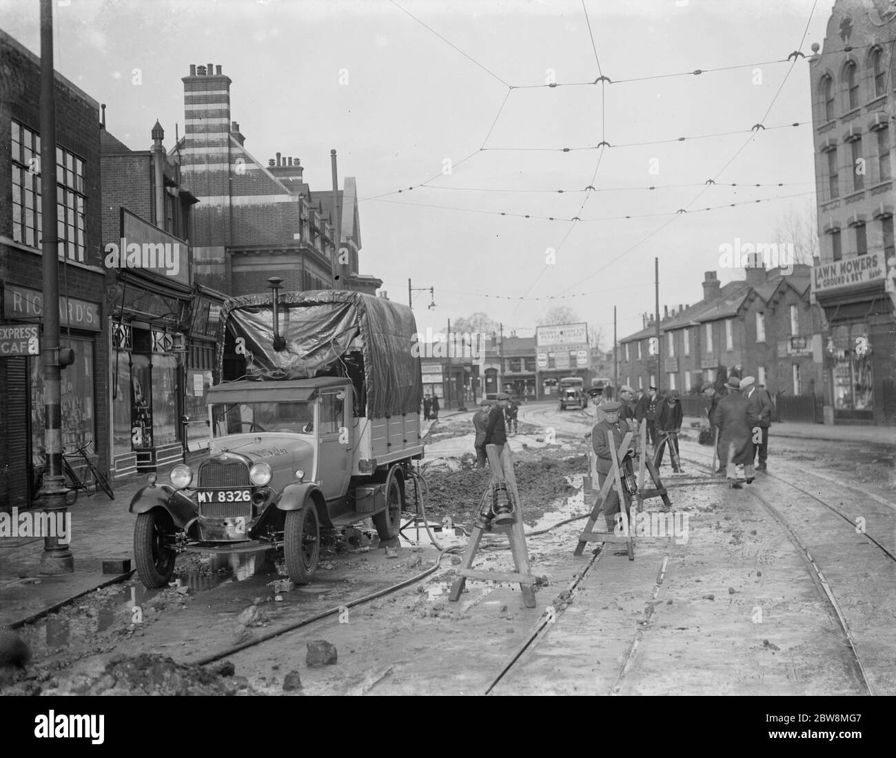 A mains water burst in Lee . 1936 . Stock Photo