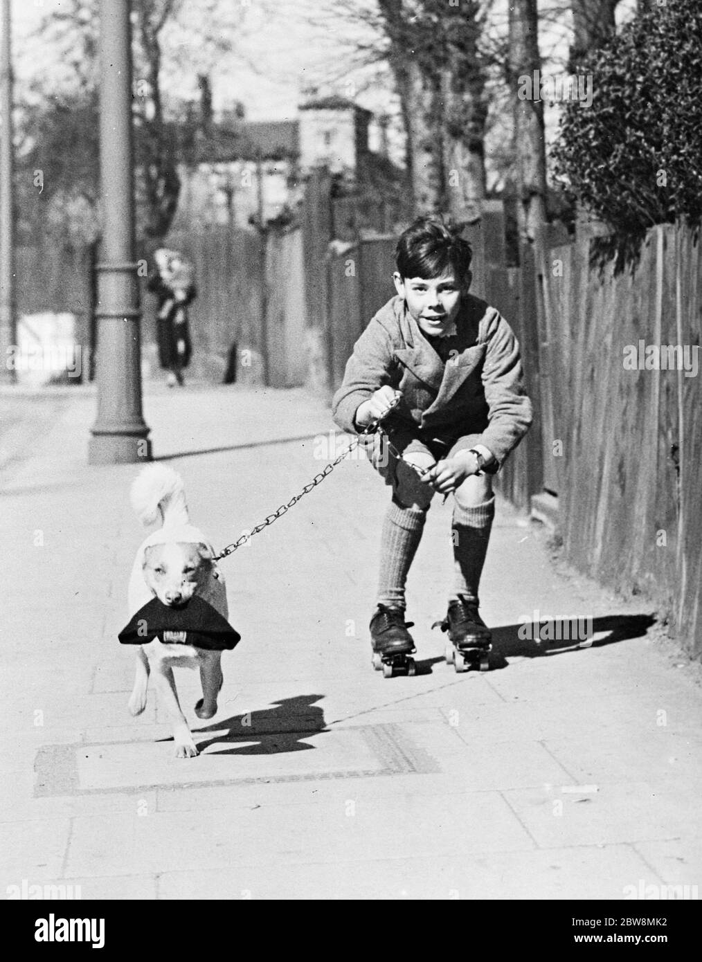 Paul Wilson and dog Mickey . 1938 Stock Photo