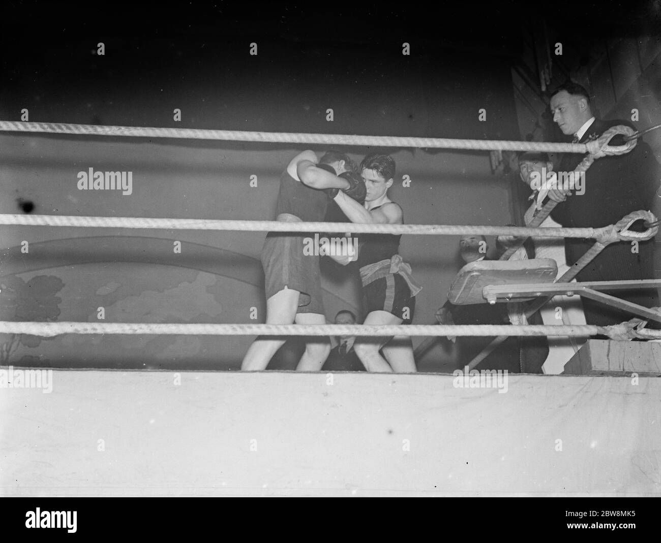 Boxing club contest between Eltham boxing club and Battersea boxing club . Blake and Williams compete in the ring . 1936 Stock Photo