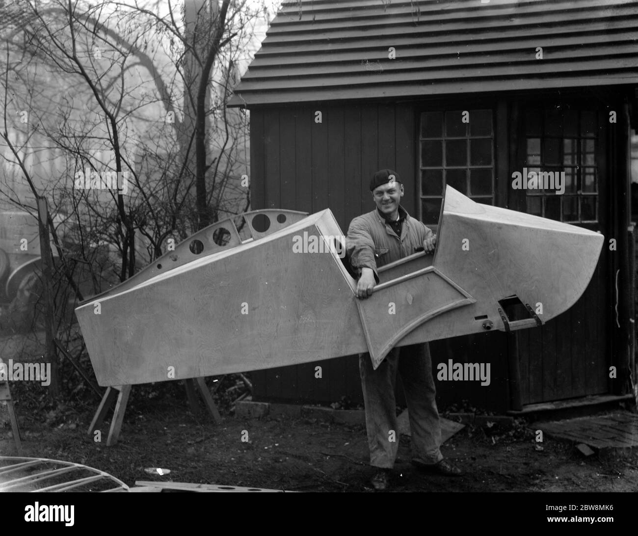 Mr Tarratt and the body of his flying flea plane. 1936 Stock Photo