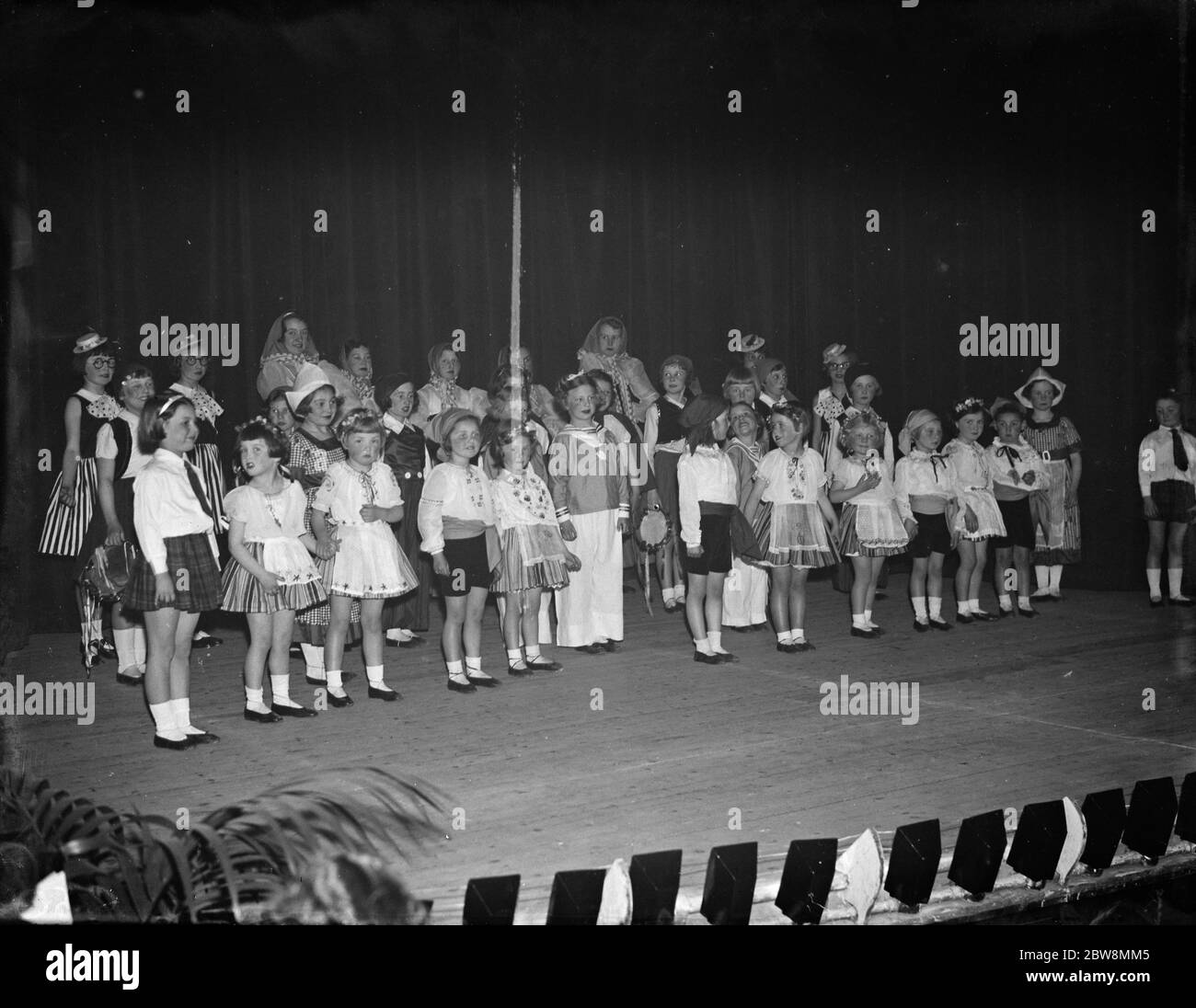 The Eltham Park School of dancing show off their fancy dress costumes . 1938 Stock Photo