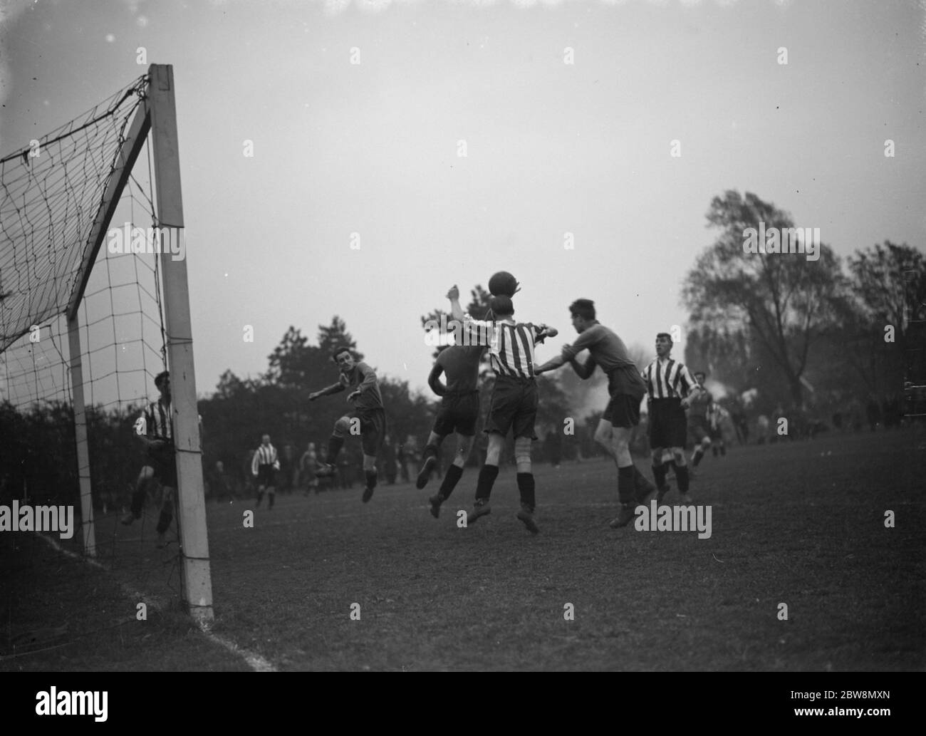 Football match . Goalkeeper in action . 1935 Stock Photo