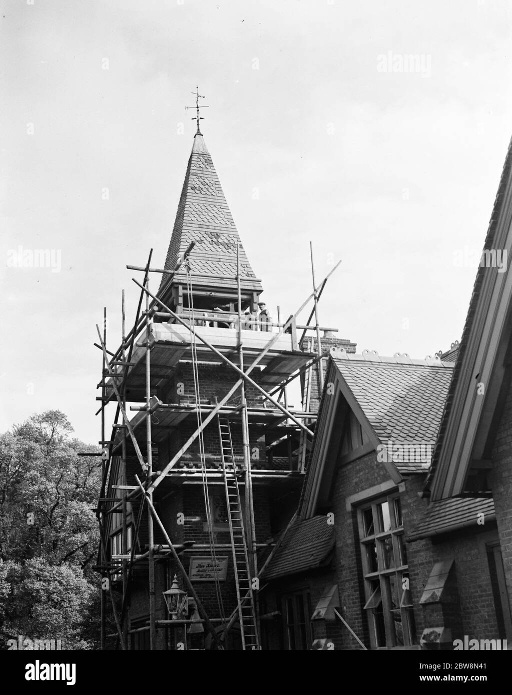 Clock tower repairs at the Harenc School in Foots Cray , Kent . 1937