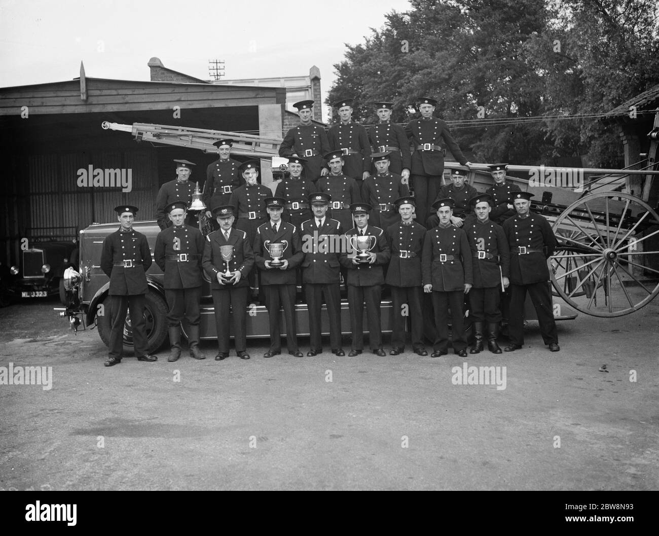 Sidcup fire brigade pose for a group photo . 1938 Stock Photo