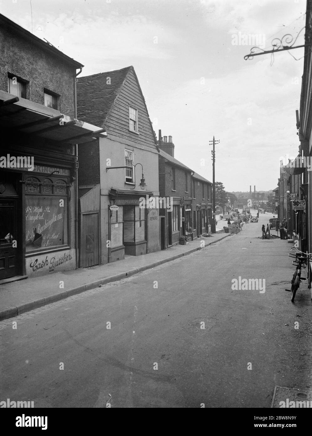 A view of the buildings on Cray Ford high street that are soon to be demolished . 7 July 1938 Stock Photo