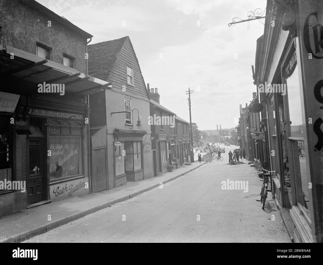 A view of the buildings on CrayFord high street that are soon to be demolished . 7 July 1938 Stock Photo