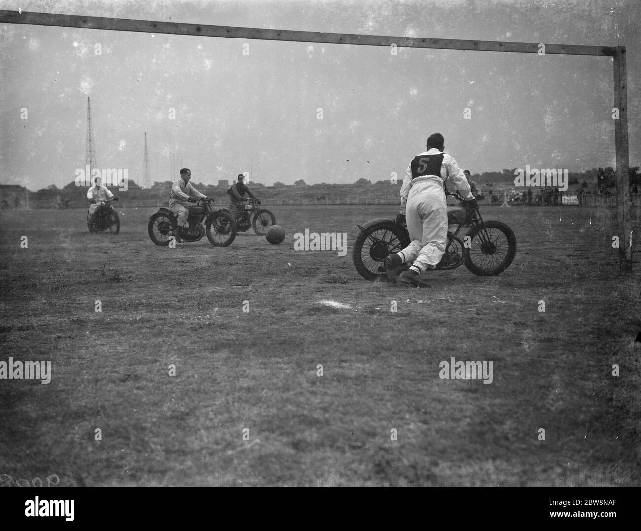 The Eltham and Bromley gymkhama . Motorcyclists play football . 1938