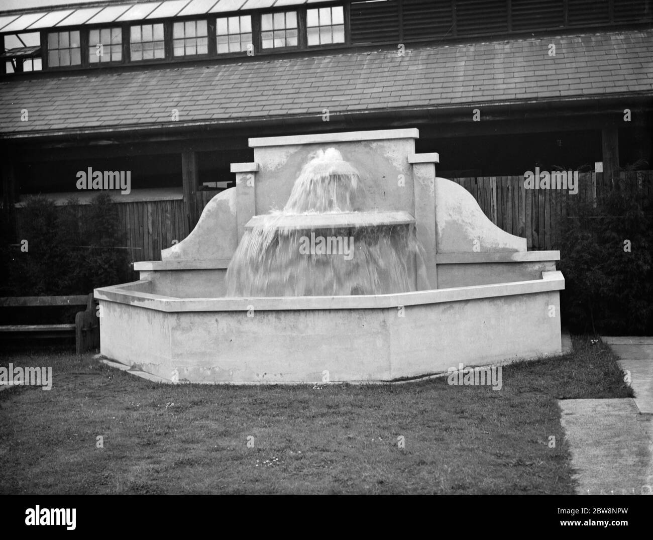 The Val De Travers Cascade by the the swimming pool at Aldenham school in Elstree Hertsfordhire . 2 June 1938 Stock Photo