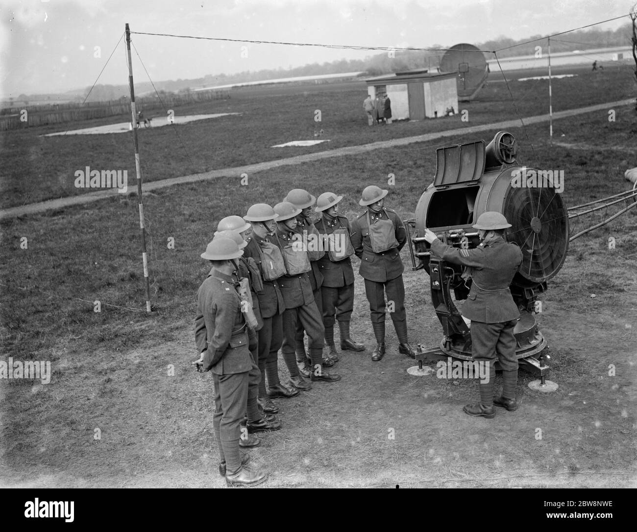 anti aircraft men are given training on searchlights . 1936 Stock Photo