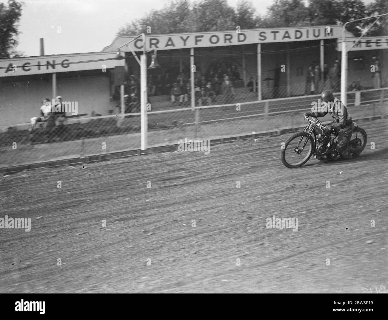 Speedway bikes begin to take the bend at the Crayford track . 1936 Stock Photo