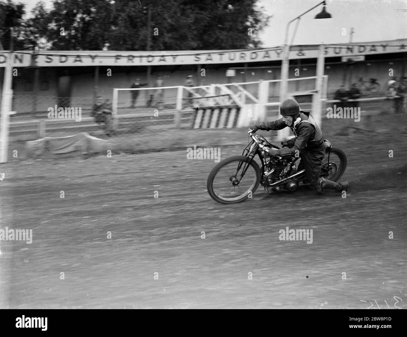 Speedway bikes begin to take the bend at the Crayford track . 1936 Stock Photo