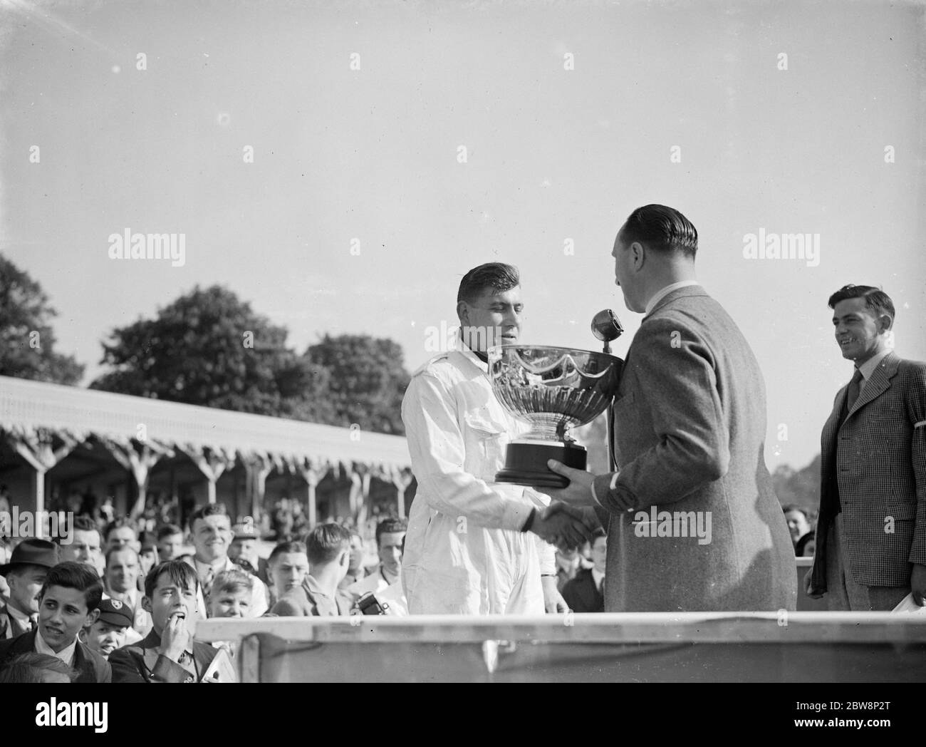 J H T Smith receives his cup . 1938 Stock Photo