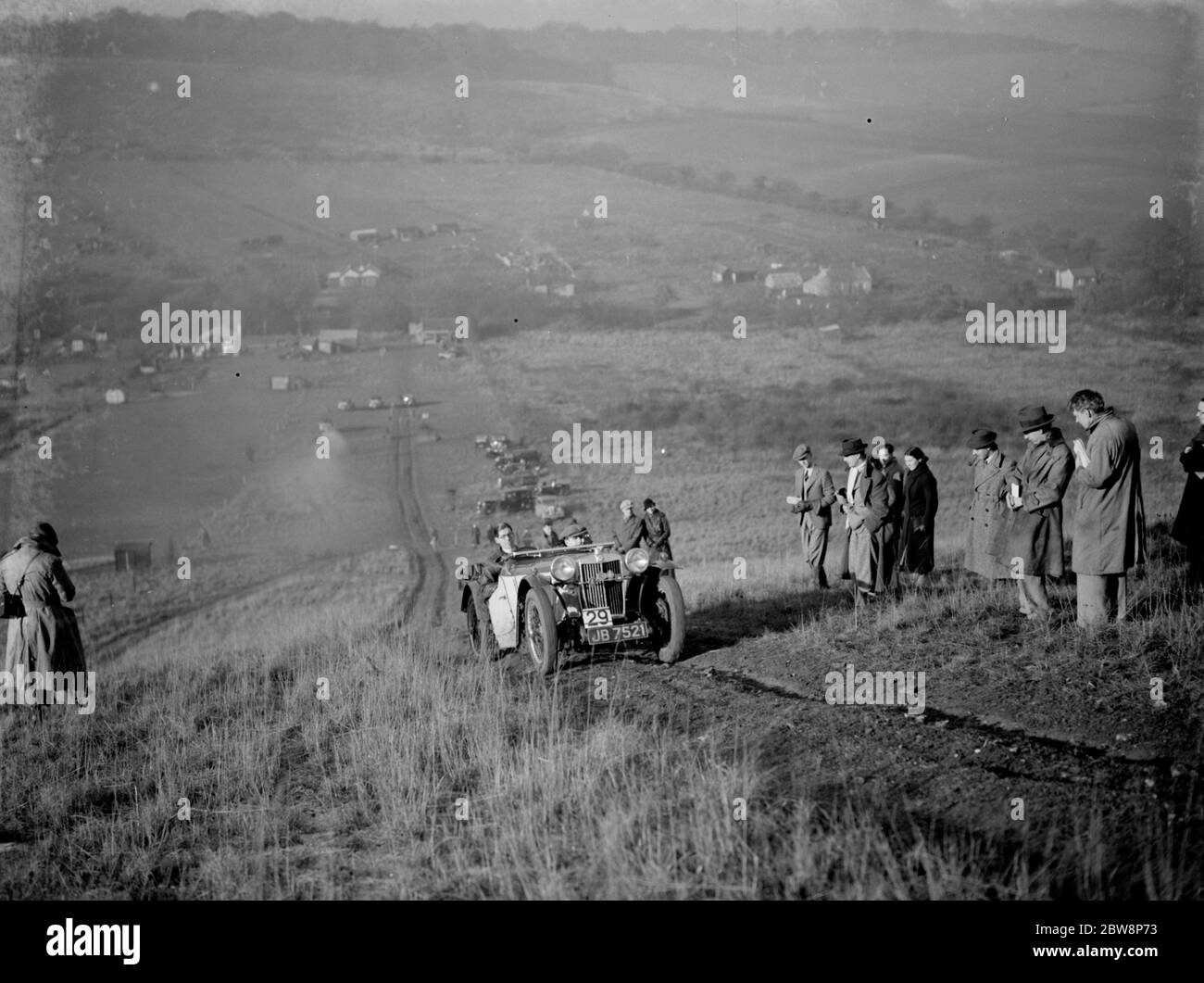 Kentish Border Car Club trial . A competitor struggles on the hill climb . 28 November 1935 . Stock Photo