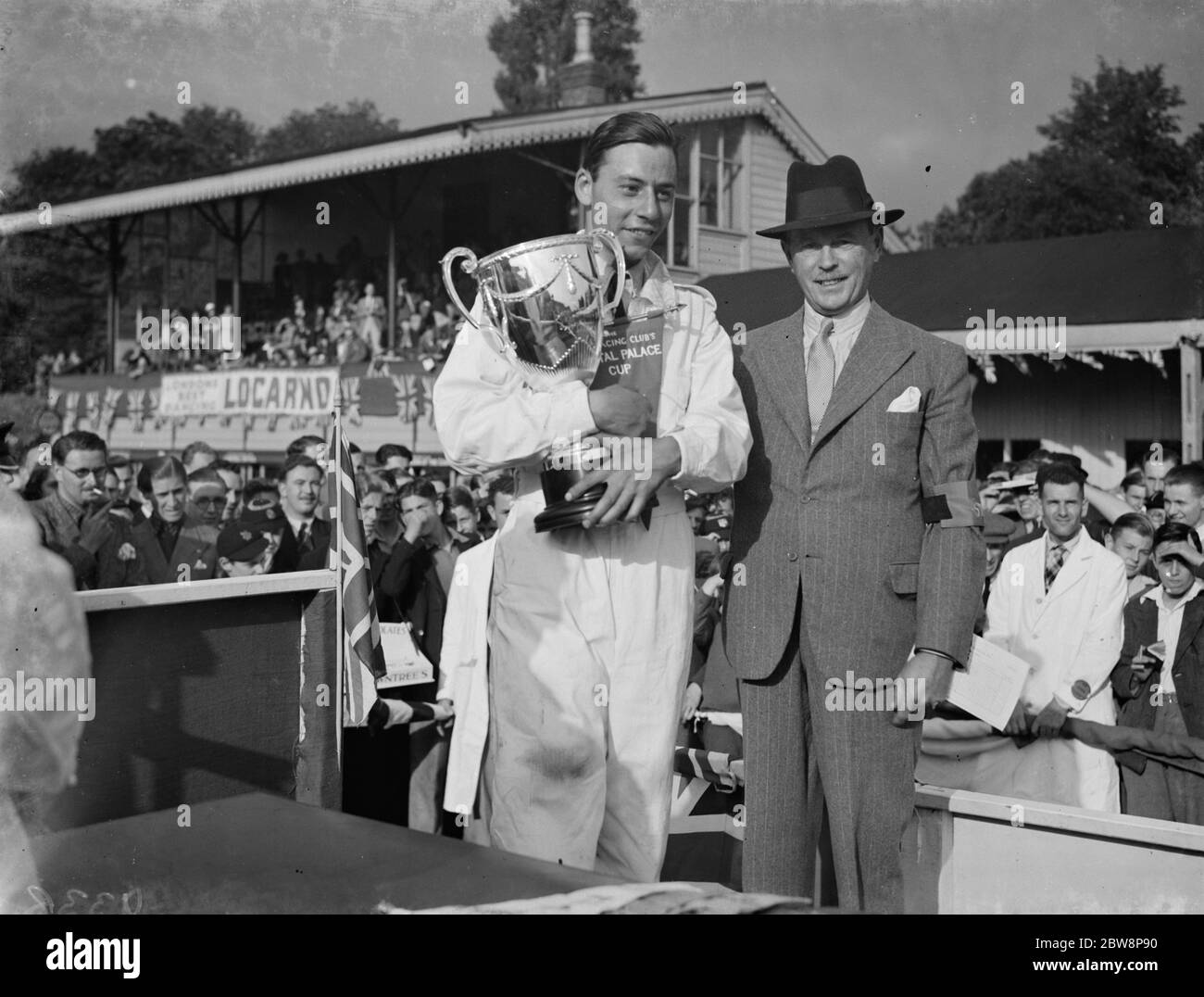 Crystal Palace road racing . The winner receiving his cup . 1938 Stock Photo
