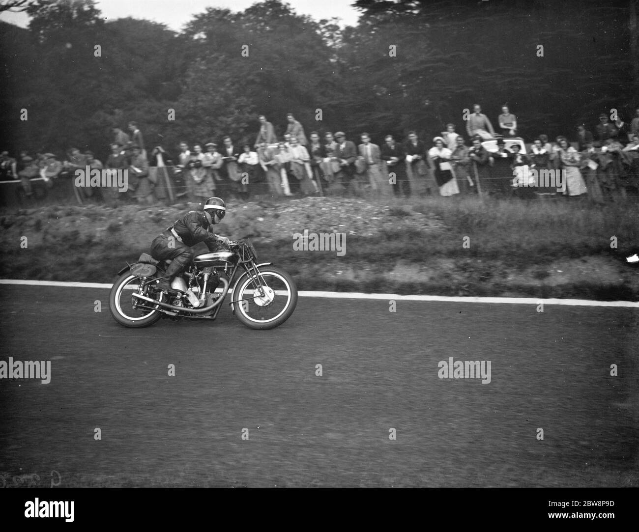 Crystal Palace motorcyle racing . K Bills races down the track . 1938 Stock Photo
