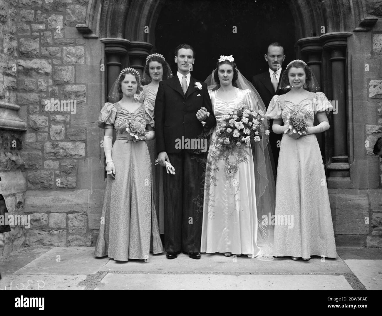 The wedding of Mr Hall and Miss O M Lewis . The wedding group . 13 August 1938 Stock Photo