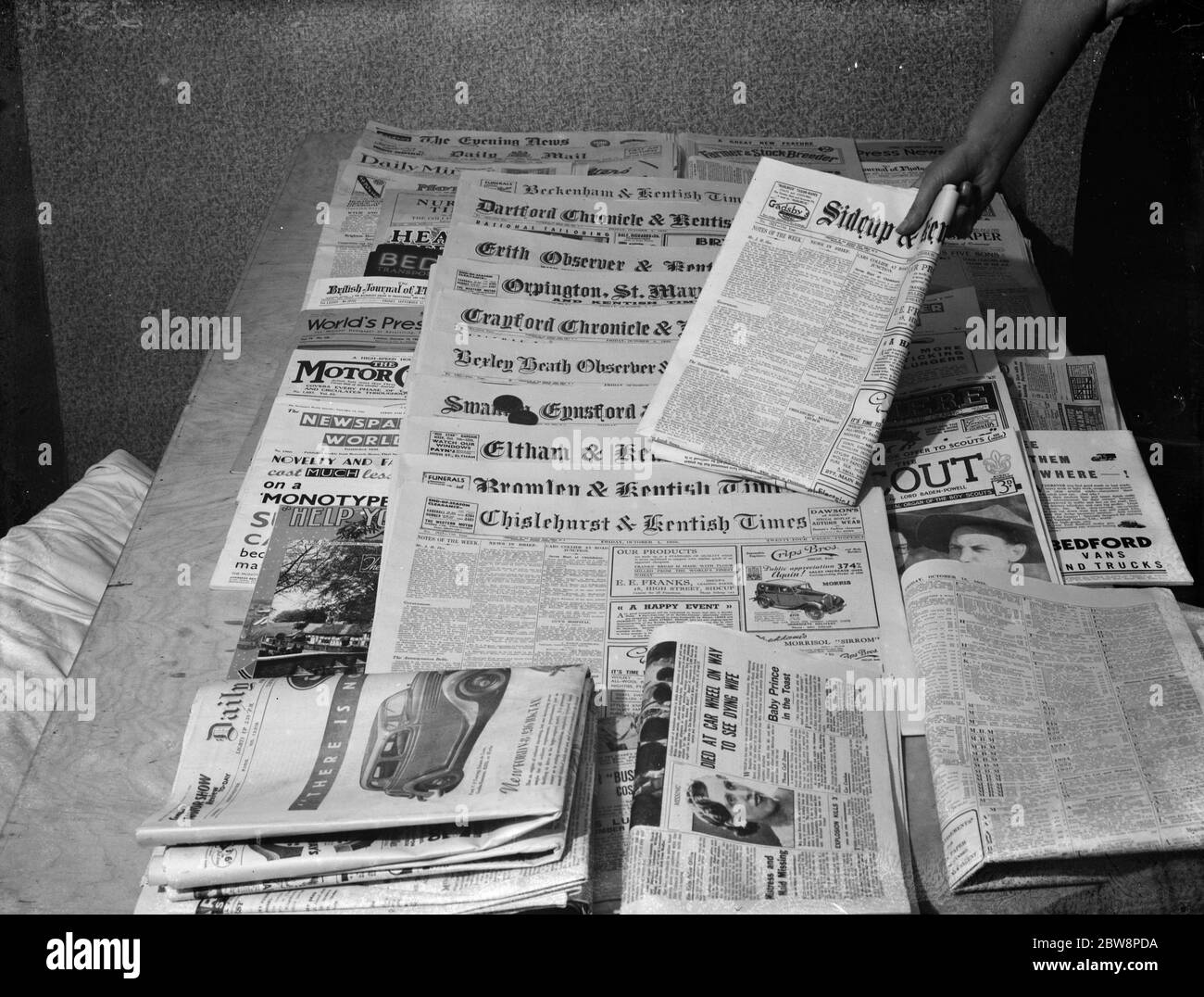 All the local editions of the Kentish Times newspaper on display . 1935 Stock Photo