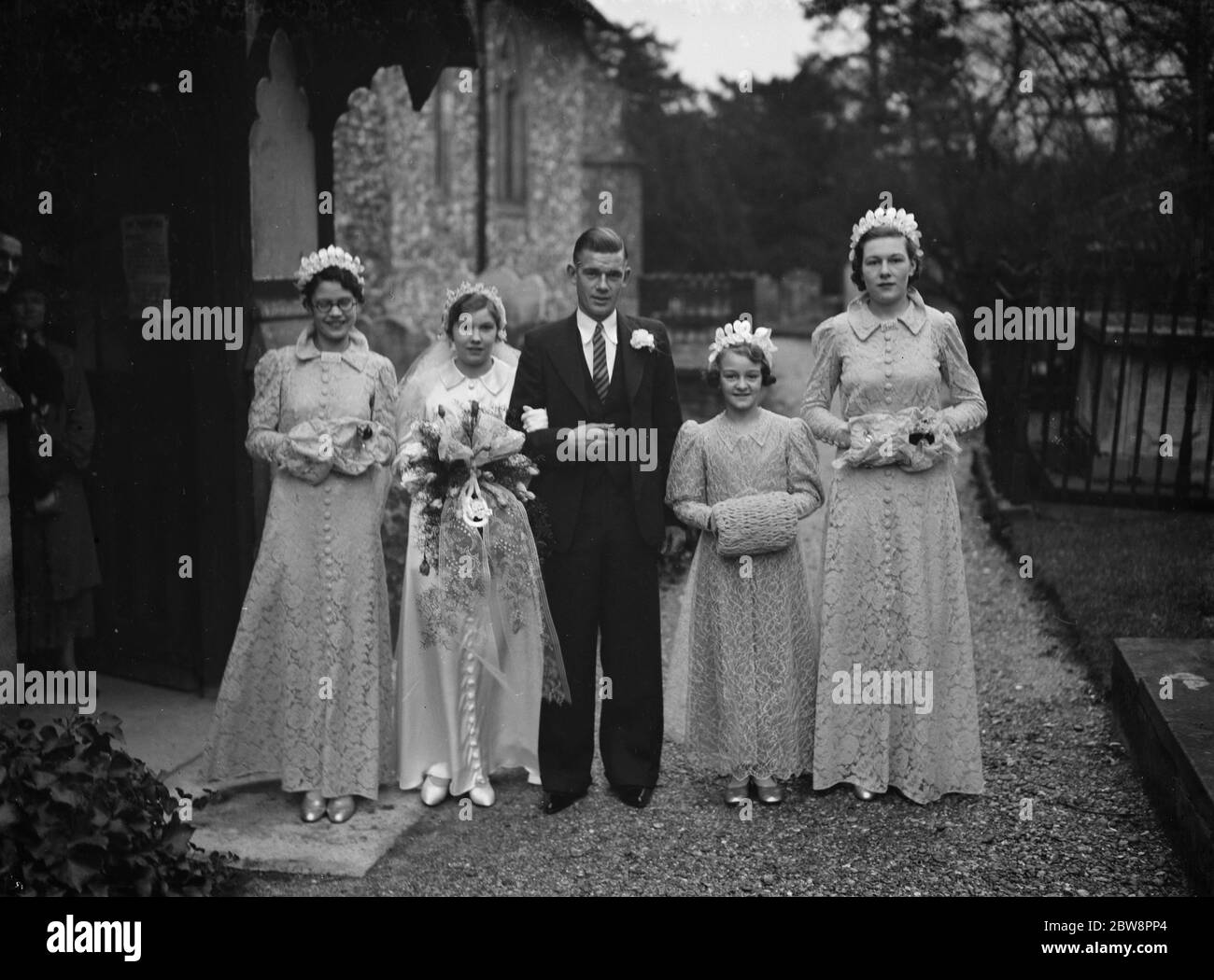 The wedding of Mr R Gadman and Miss I Hampshire . The bridal group . 1937. Stock Photo