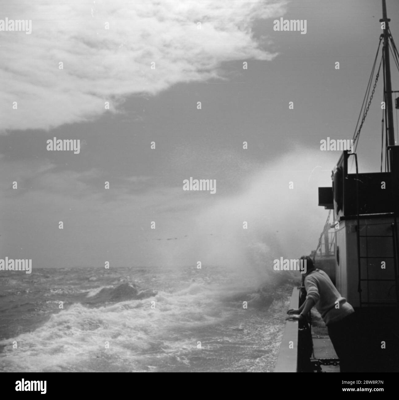 Steamship navigating through rough seas . 1936 Stock Photo