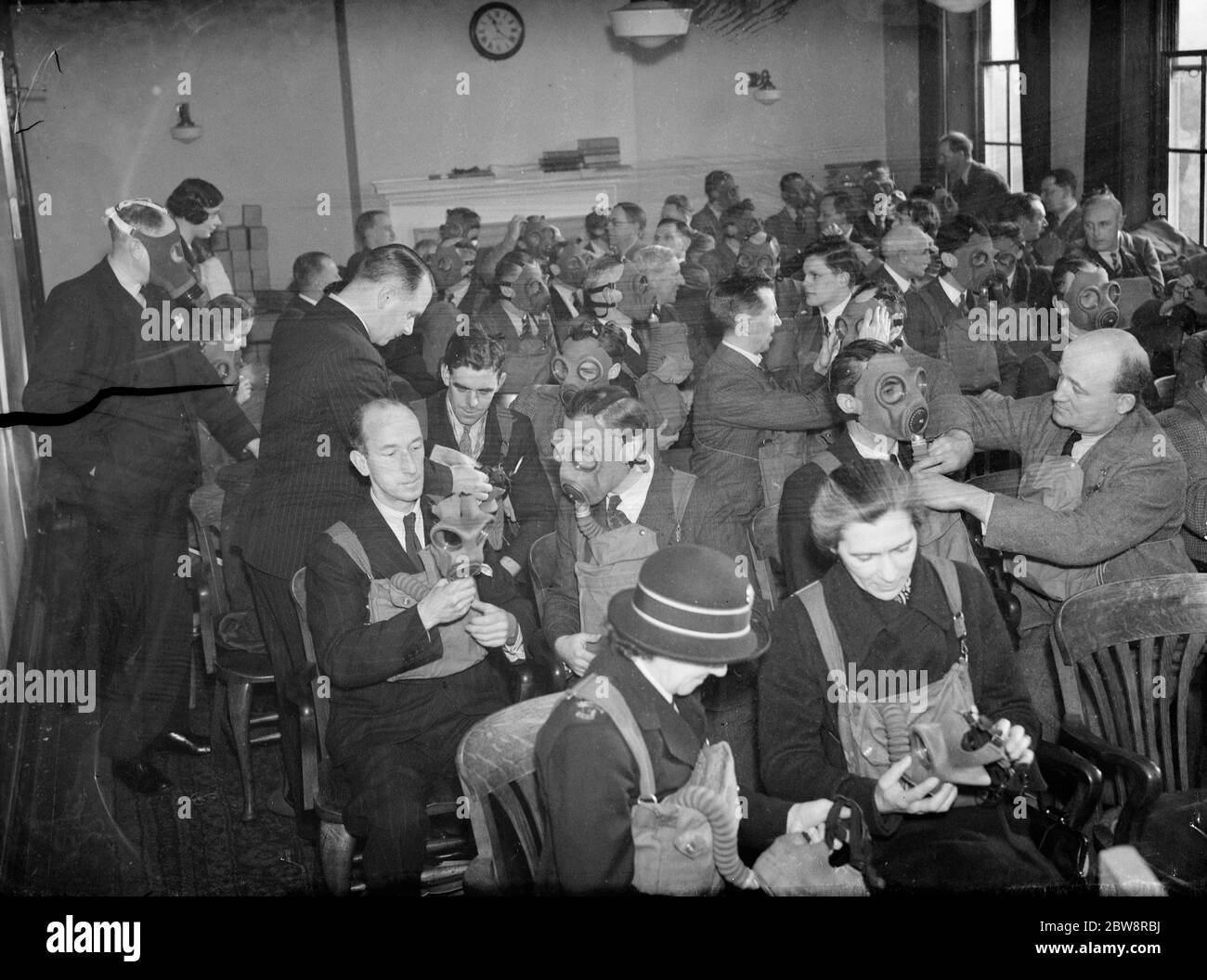 Gas mask instruction at the council offices in Orpington , Kent . January 1938 Stock Photo