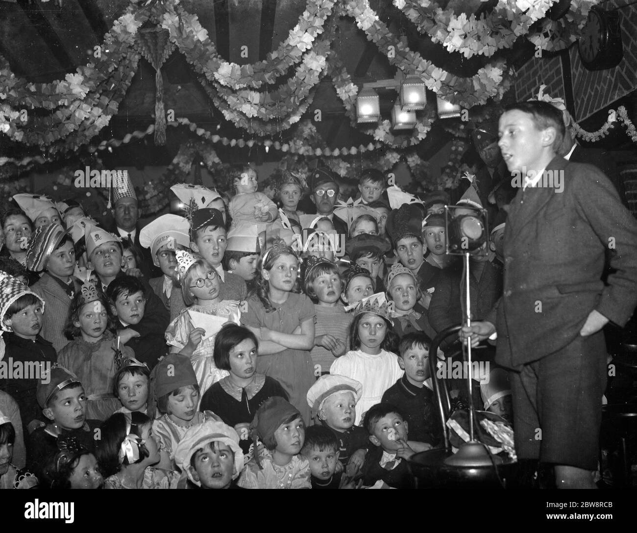 The South Metropolitan Electric Light and Power Company , hold their children ' s party . 1938 Stock Photo