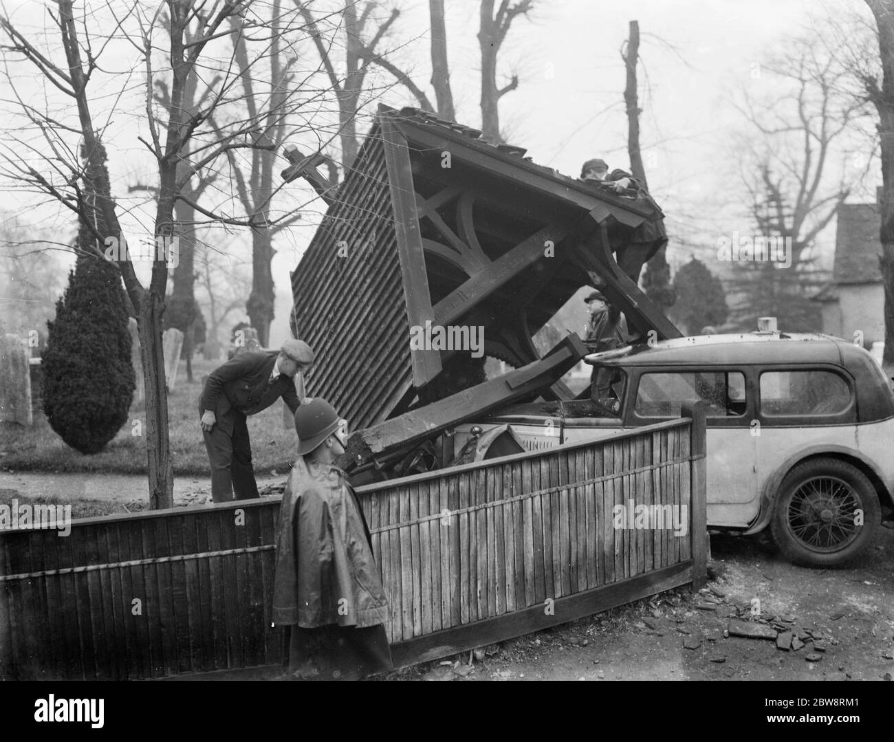 Car smashes in to the lych gate at Foots Cray church , Kent . 1935 Stock Photo