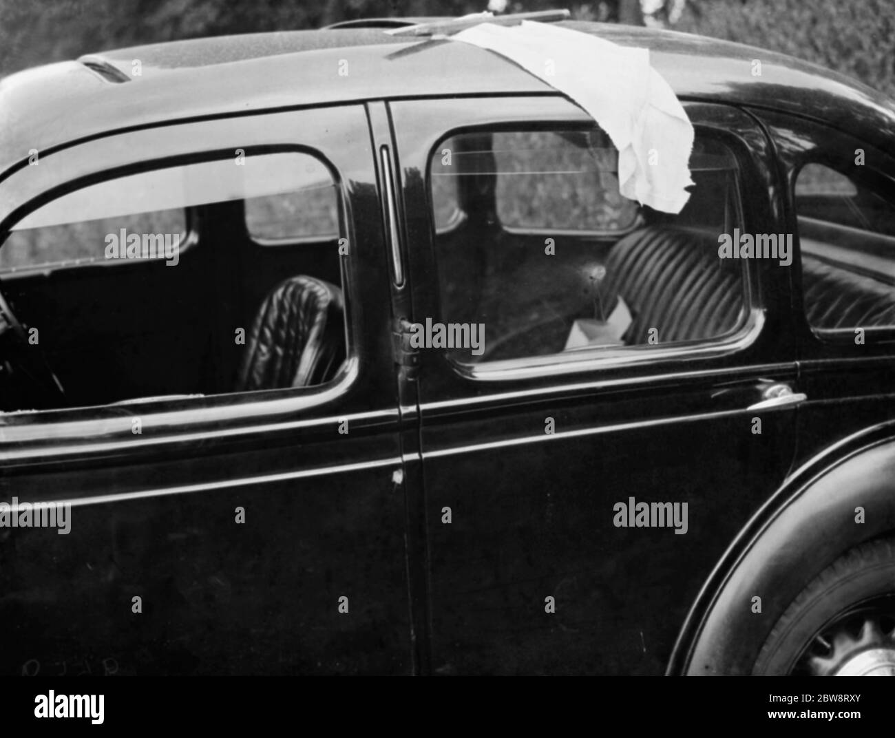 The abandoned getaway car that was used in the Downe post office robbery . 8 September 1938 . Stock Photo