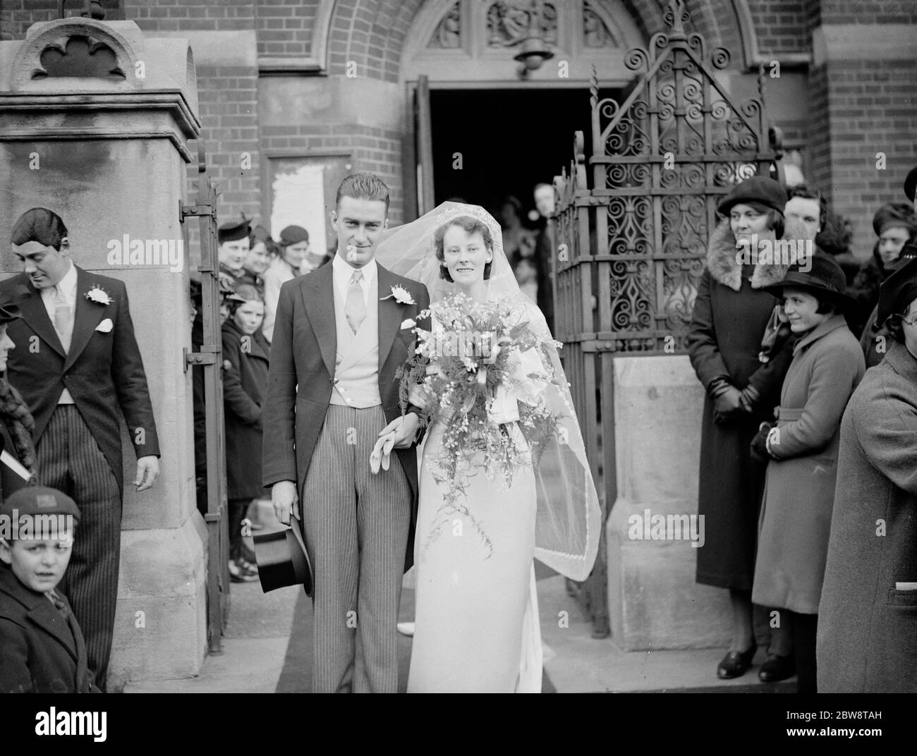 Wedding of Mr RAD Lascelles and Miss M D Turner . The bride and groom leaving the church . 26 February 1938 Stock Photo