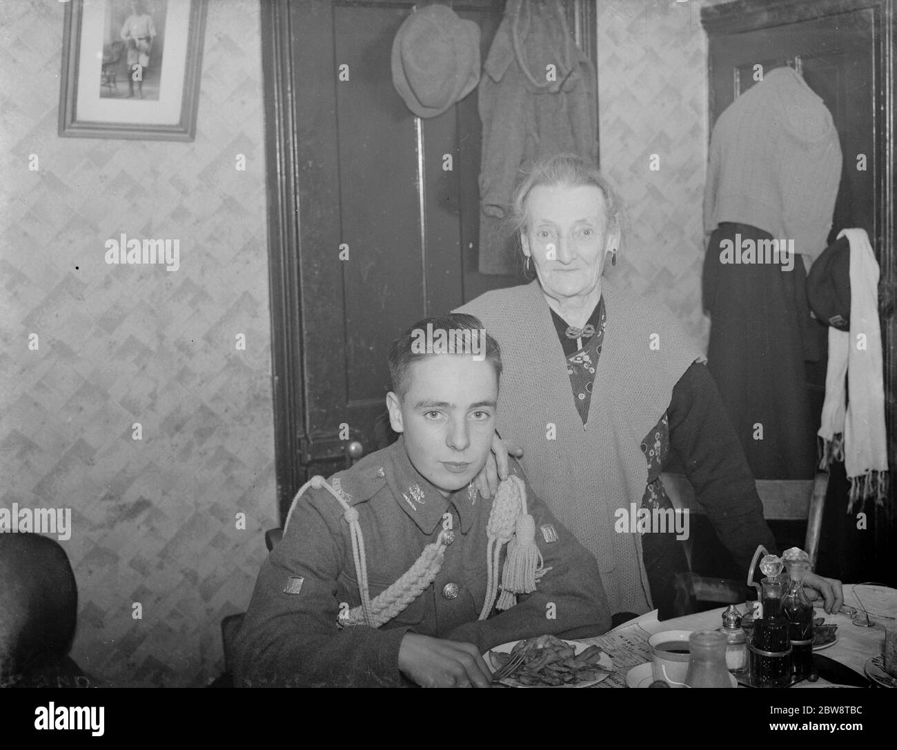 Harry Bassam the drummer boy with Granny Welling . 1938 Stock Photo